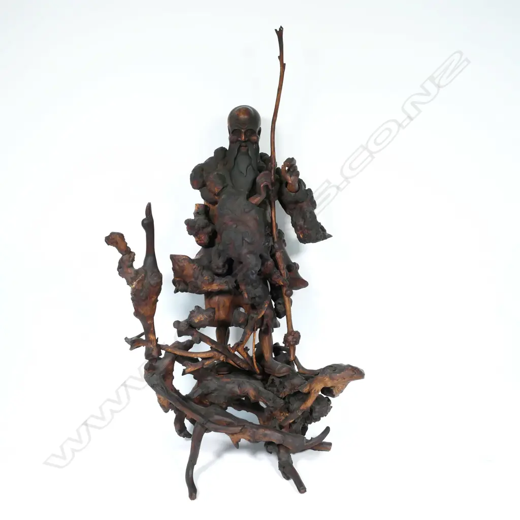 An old Chinese rootstock assemblage and carving of a sage Image 1++
