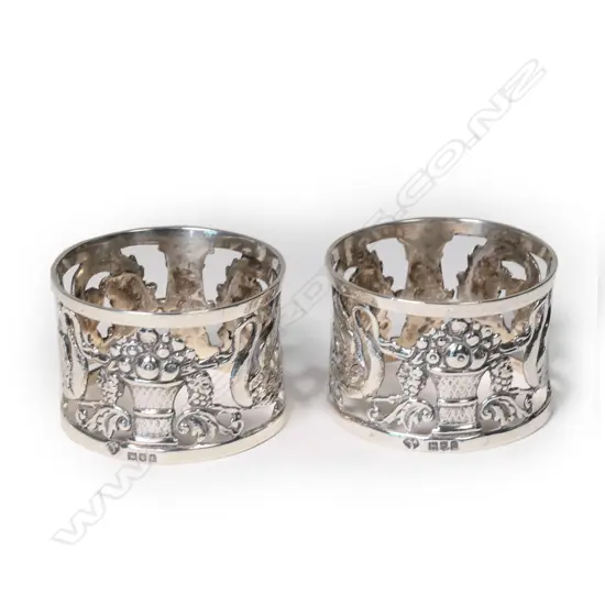 A pair of silver napkin rings