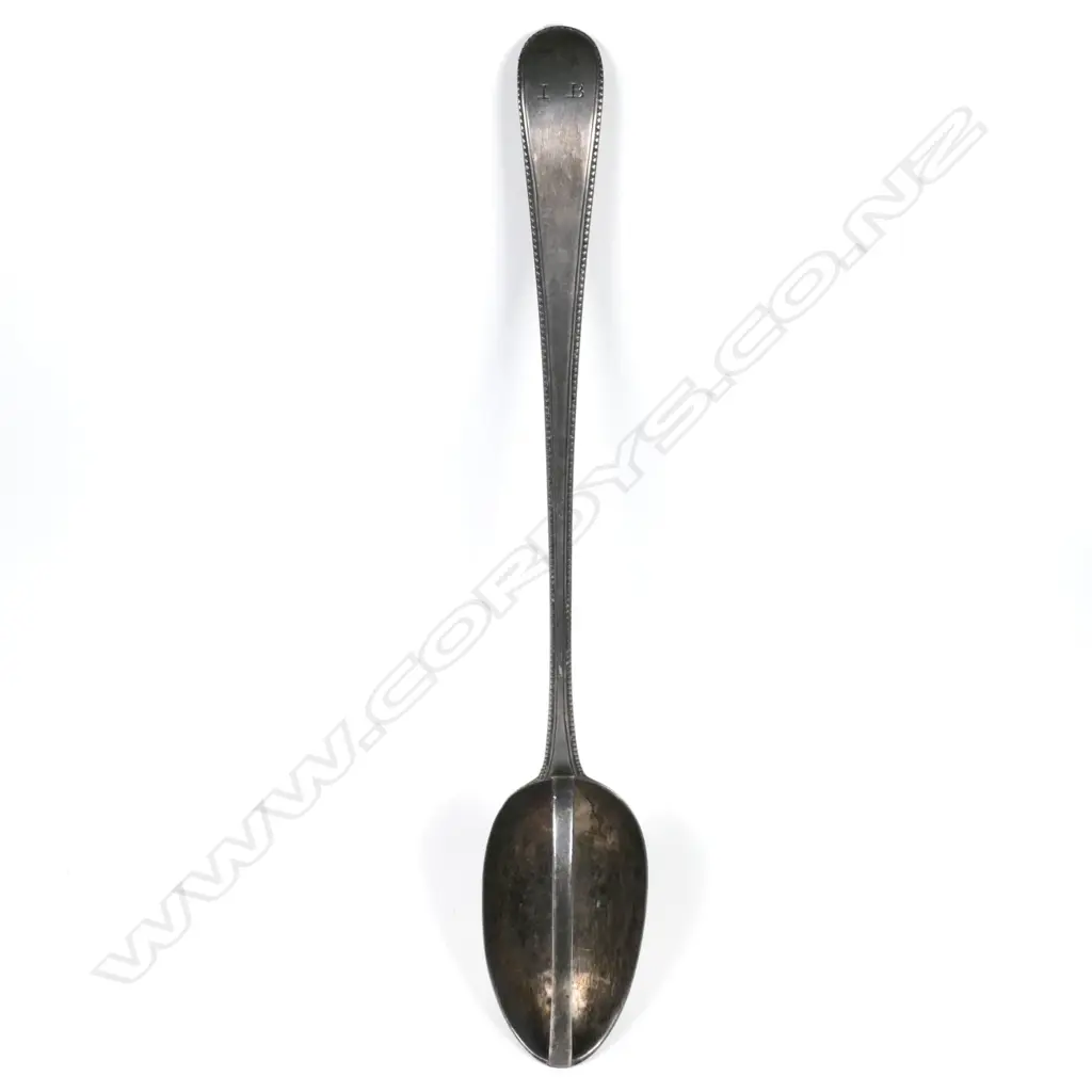 A George III silver gravy strainer spoon Image 1++