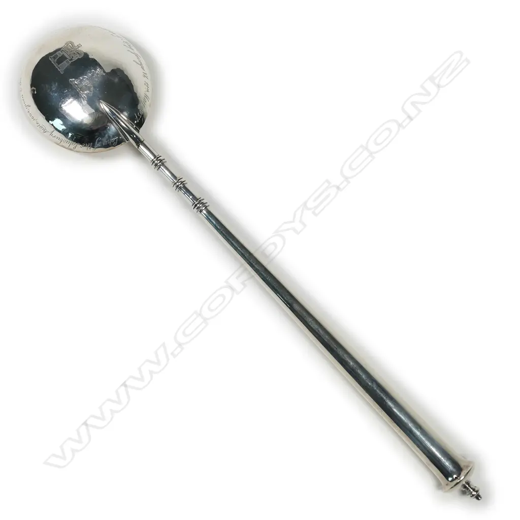 An impressive silver serving spoon Image 1++