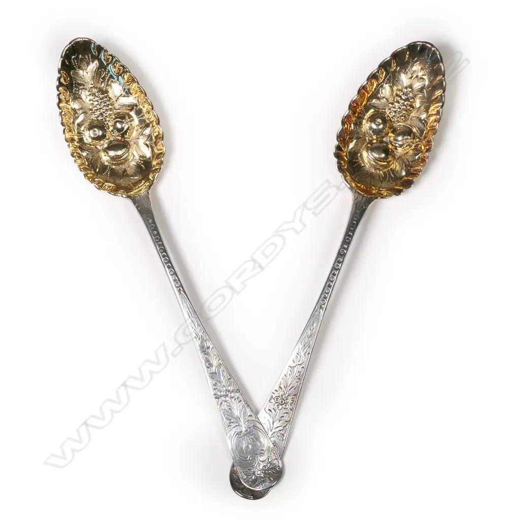 A pair of George III silver berry spoons Image 1++