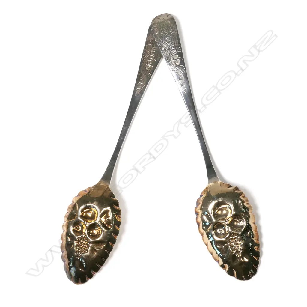 A pair of George III silver berry spoons Image 1++
