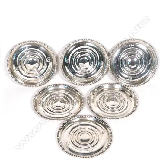 A set of six New Zealand silver glass coasters