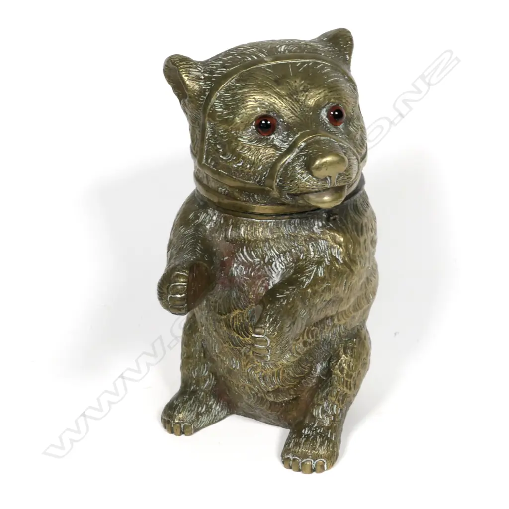 A decorative late 19thC brass inkwell modelled as a seated baby bear Image 1++