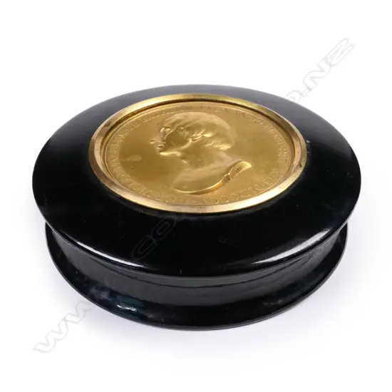 An early 19thC black lacquer commemorative snuff box