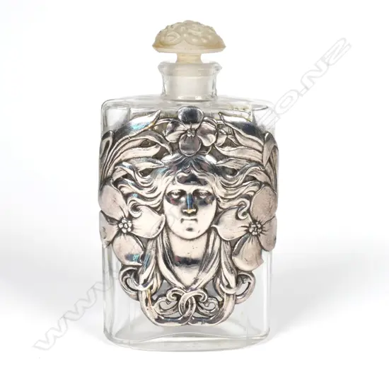 An early 1900s French glass perfume bottle