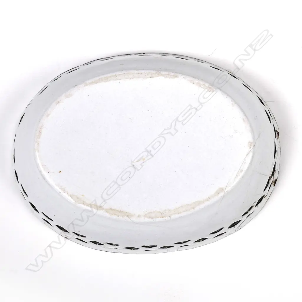 A small enamel dish Image 1++