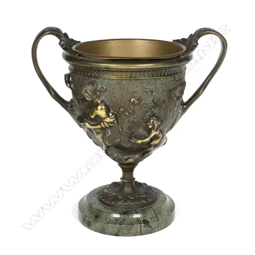 A bronze two-handled urn Image 1++