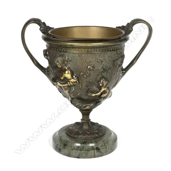 A bronze two-handled urn