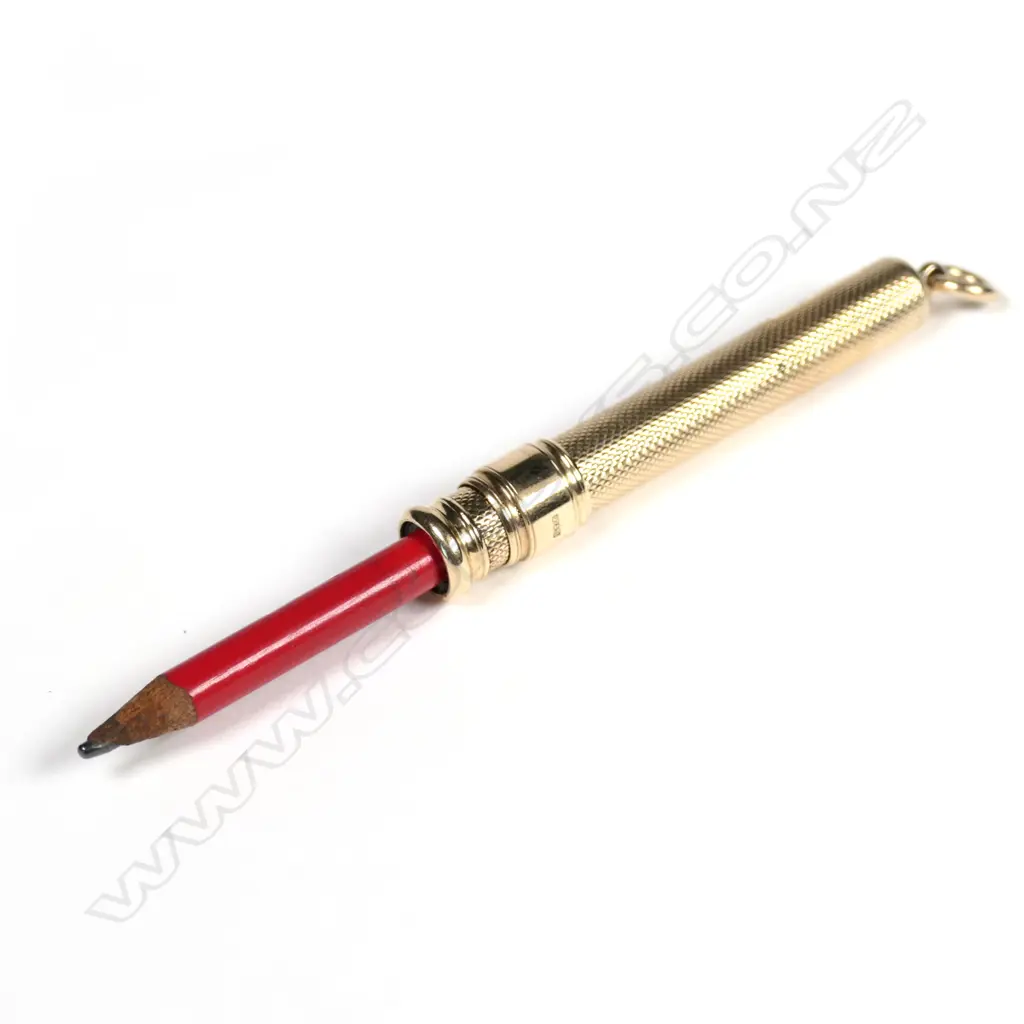 A 9ct gold pencil holder Image 1++