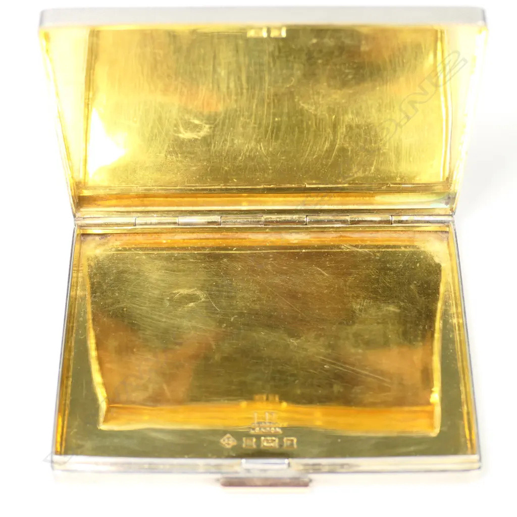 A silver and gold Dunhill cigarette case Image 1++