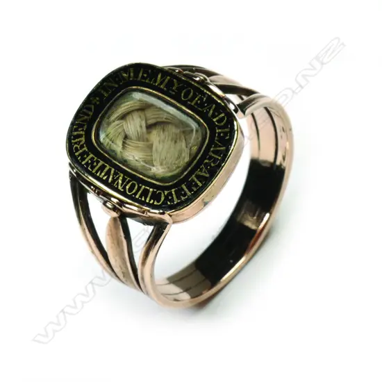 A Georgian 9ct gold and enamel mourning ring