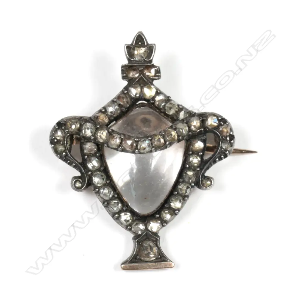 A Georgian silver gilt diamond and rock crystal mourning brooch Image 1++