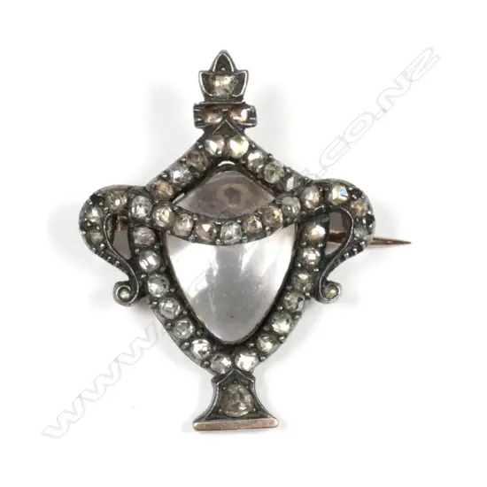 A Georgian silver gilt diamond and rock crystal mourning brooch