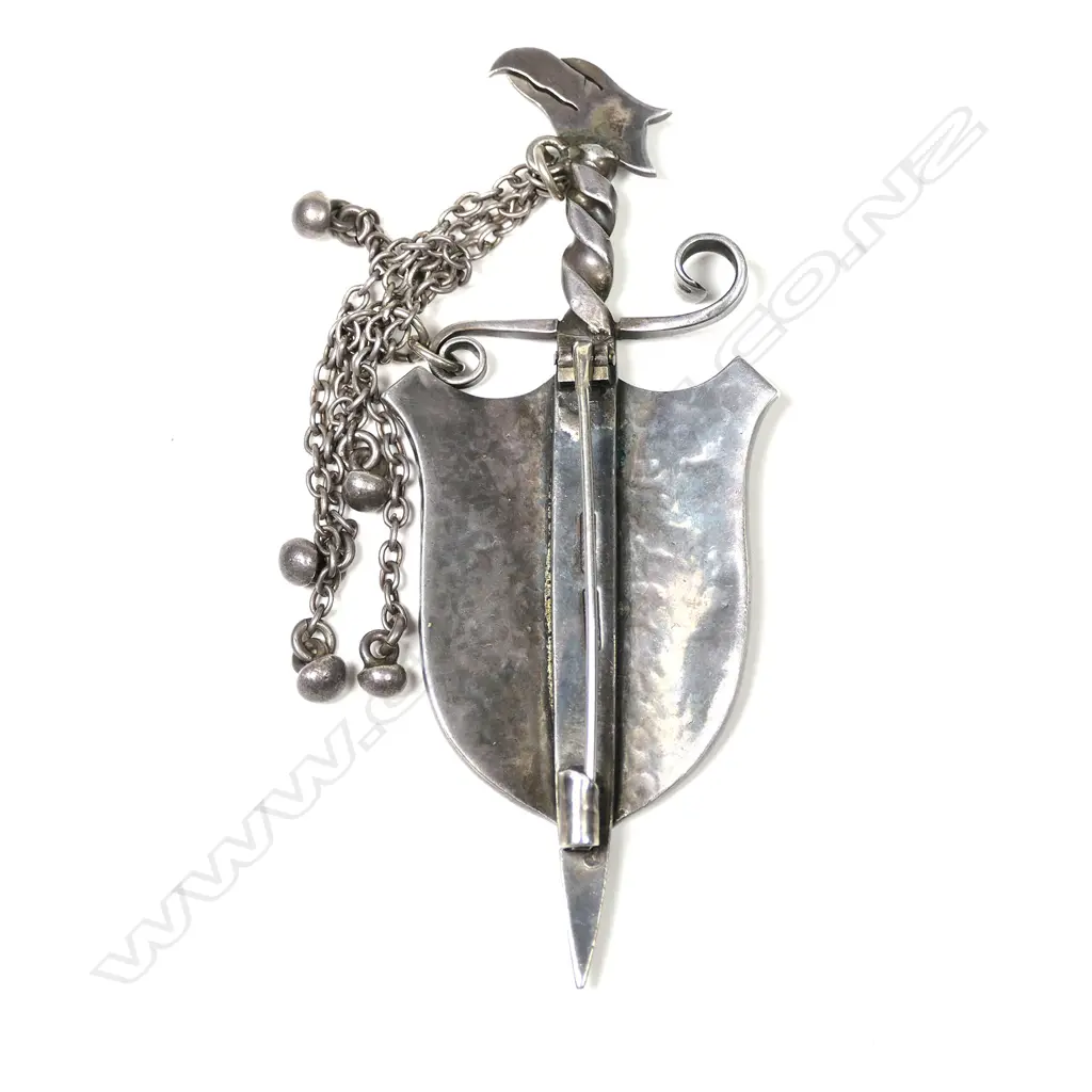 A Tony Buller 'Patoni' silver sword and shield brooch Image 1++