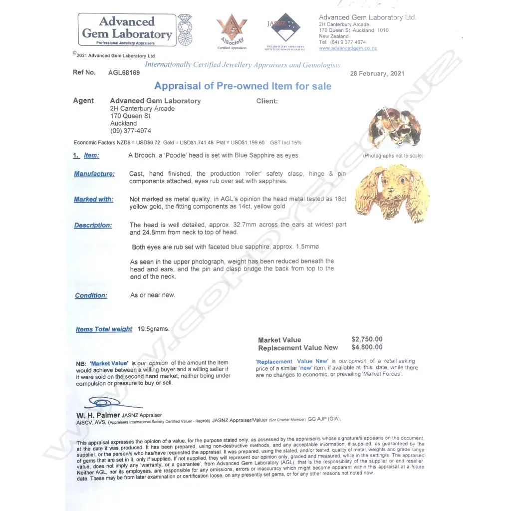 A heavy 18ct yellow gold dog head brooch Image 1++