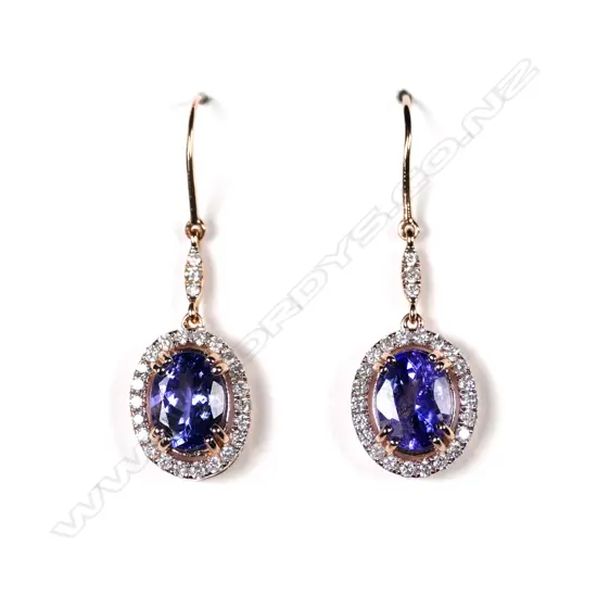 A 14ct rose gold tanzanite and diamond drop earrings