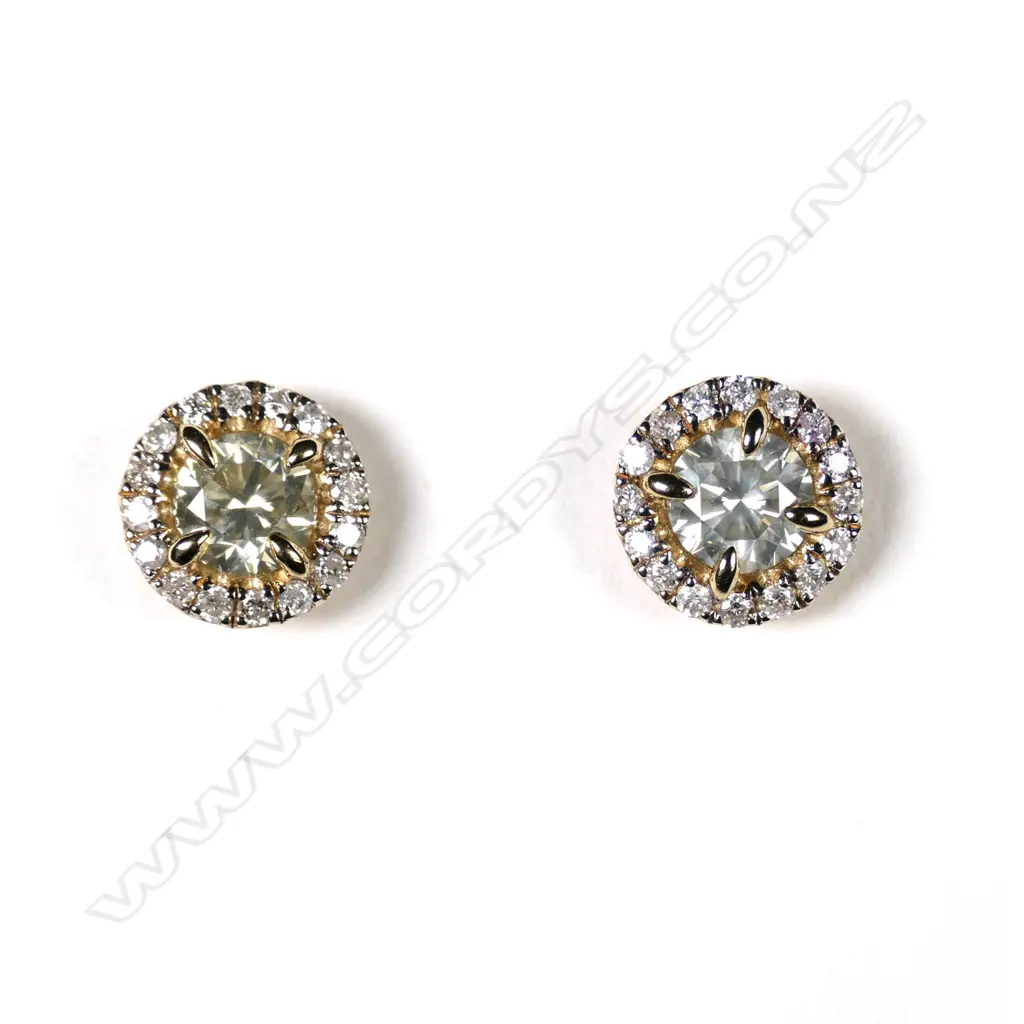 A pair of 14ct gold and diamond halo stud earrings Image 1++