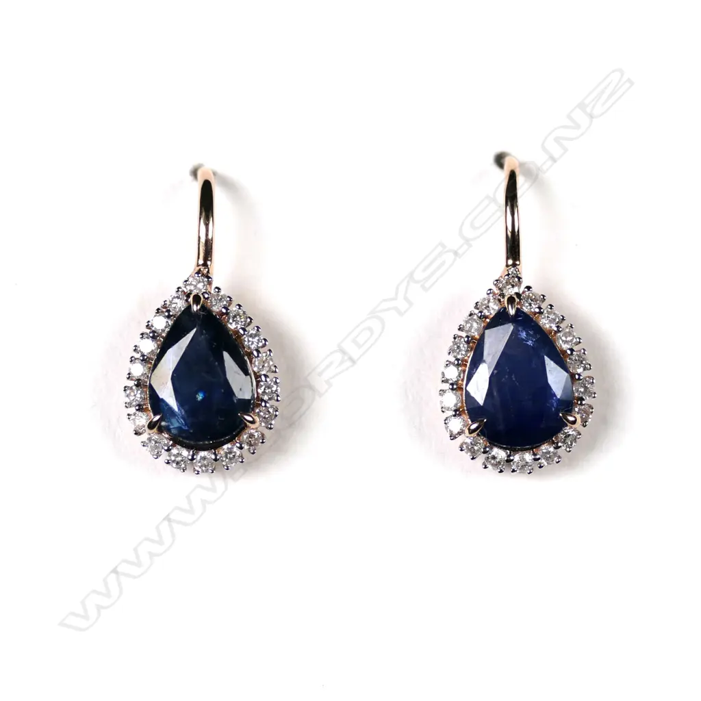 A pair of 14ct gold sapphire and diamond drop earrings Image 1++