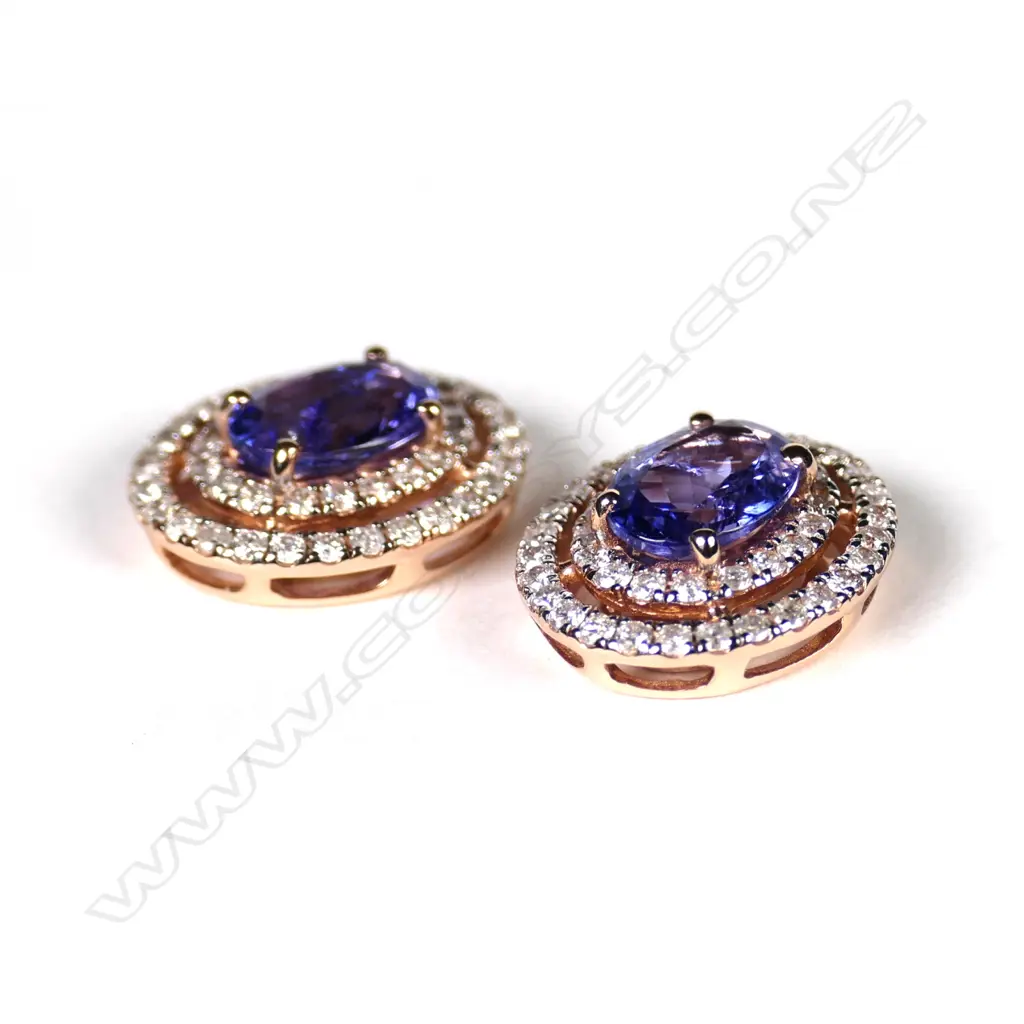 A pair of 14ct gold sapphire and diamond drop earrings Image 1++