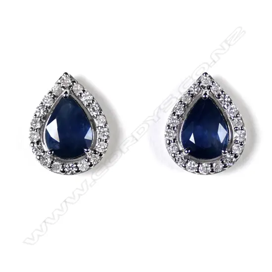 A pair of 14ct white gold sapphire and diamond stud halo earrings