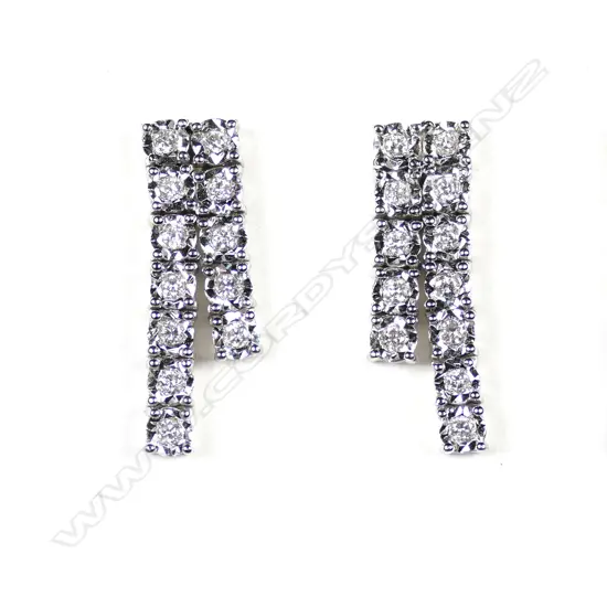 A pair of 14ct white gold and diamond earrings