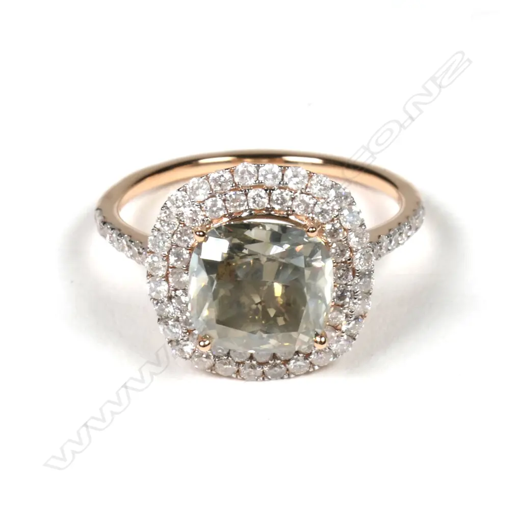 A 14ct rose gold and diamond double halo ring Image 1++