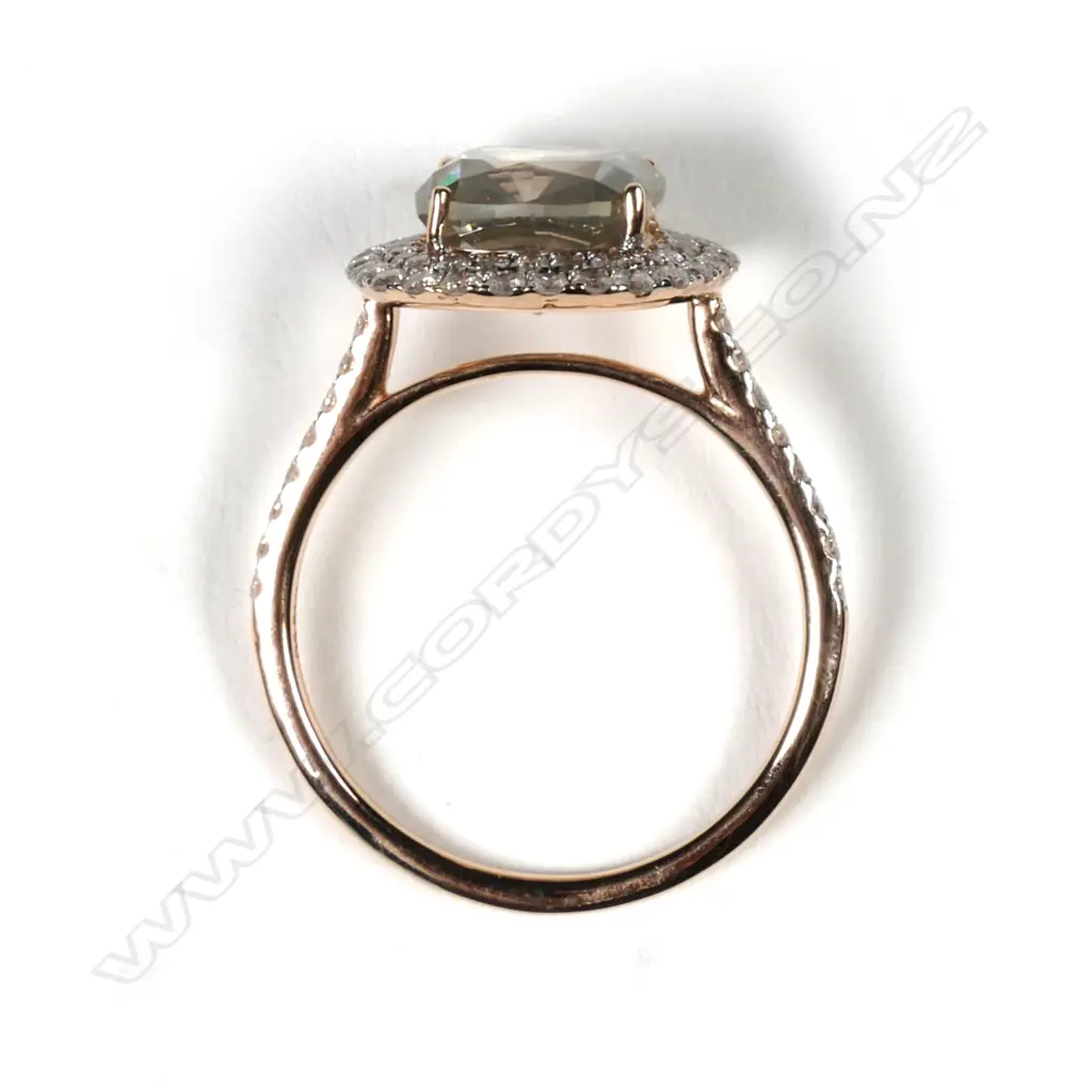 A 14ct rose gold and diamond double halo ring Image 1++