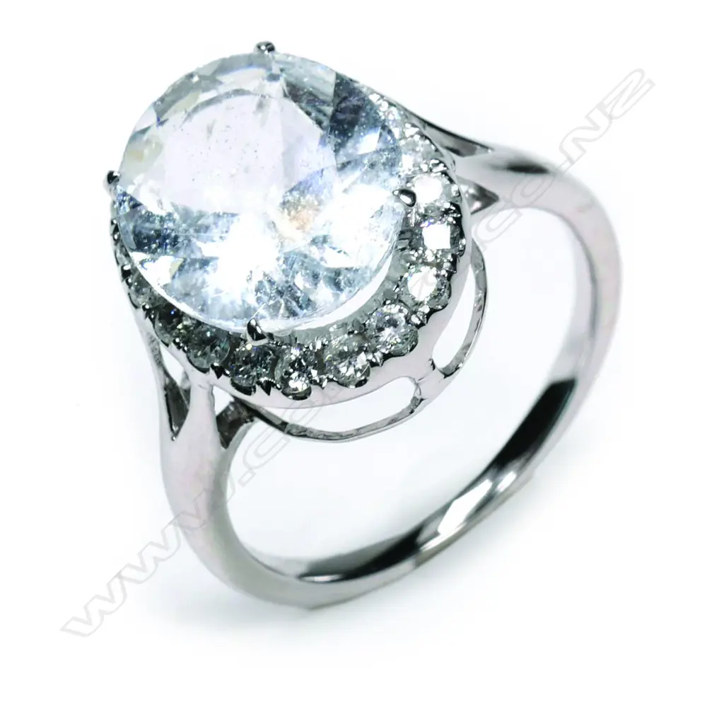 A platinum aquamarine and diamond ring Image 1++