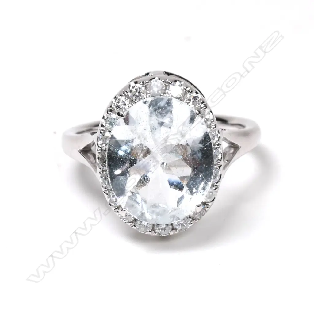 A platinum aquamarine and diamond ring Image 1++