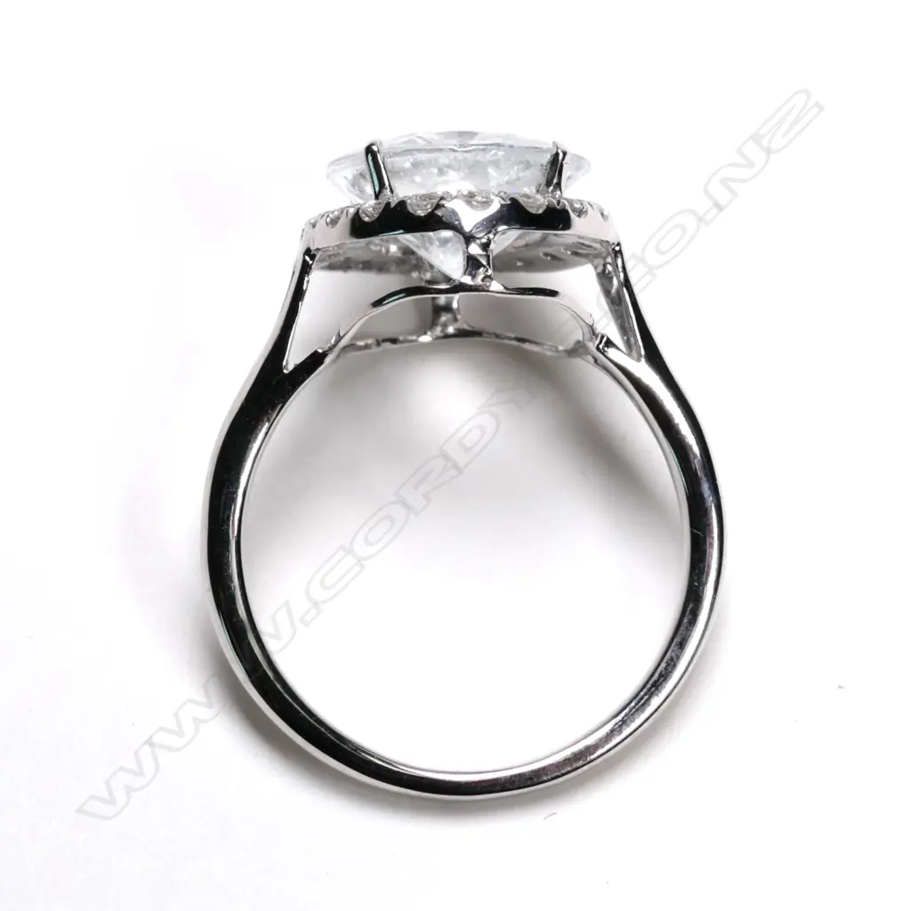 A platinum aquamarine and diamond ring Image 1++