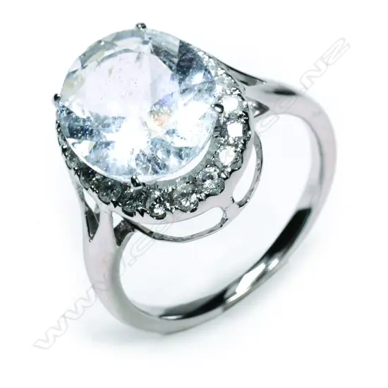A platinum aquamarine and diamond ring