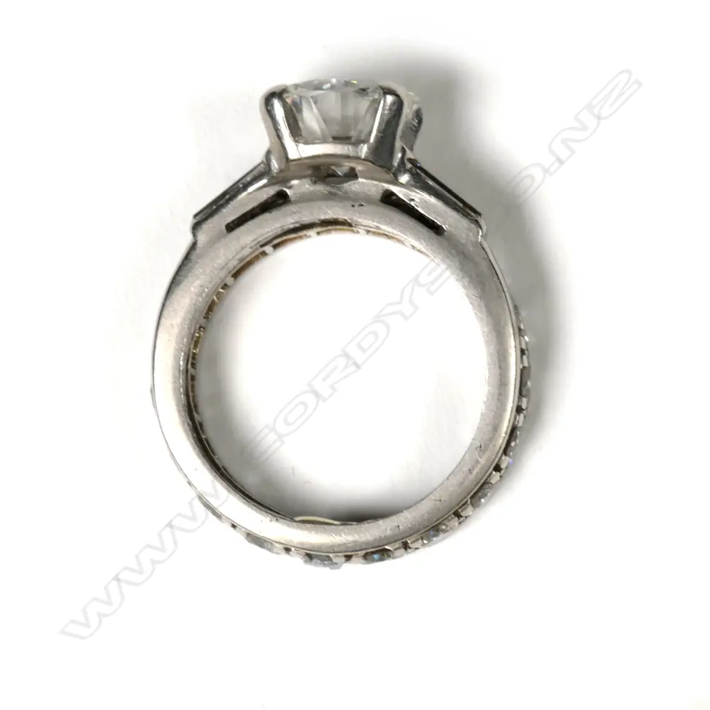 A 2ct diamond solitaire ring together with joined companion eternity band Image 1++