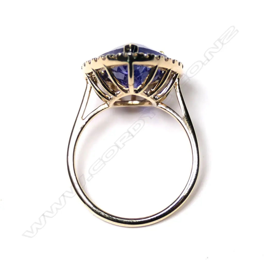 A 14ct gold tanzanite and diamond ring Image 1++