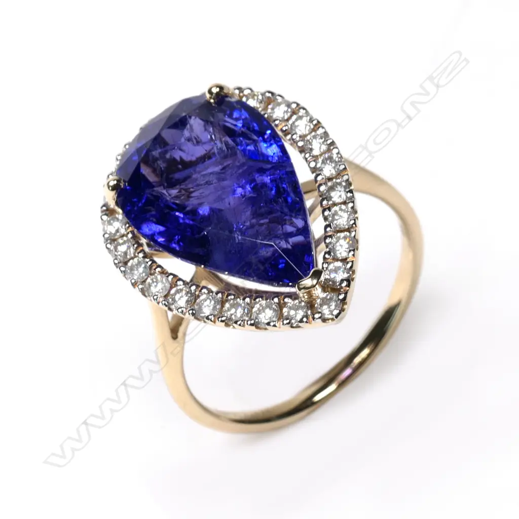A 14ct gold tanzanite and diamond ring Image 1++