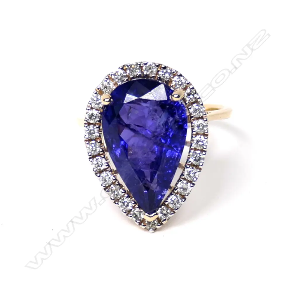A 14ct gold tanzanite and diamond ring Image 1++