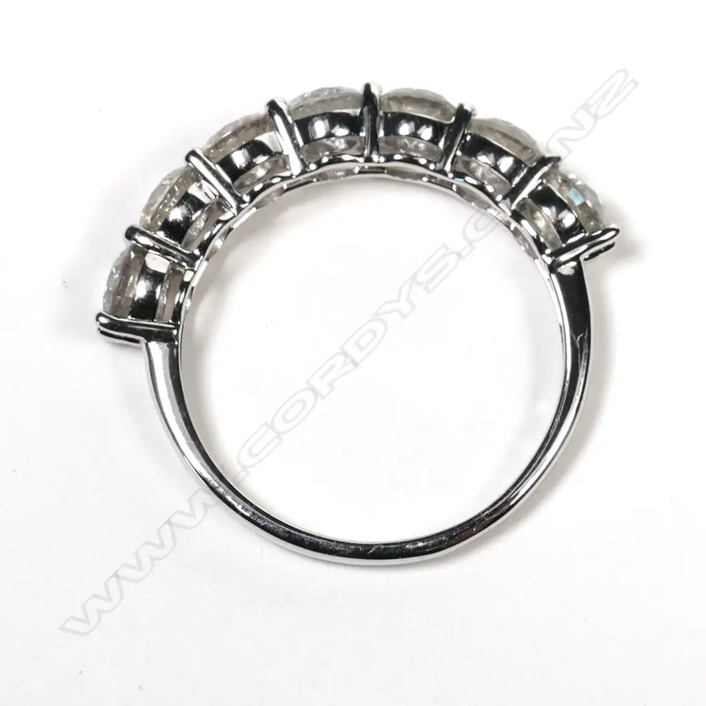 A 14ct white gold seven stone diamond ring Image 1++