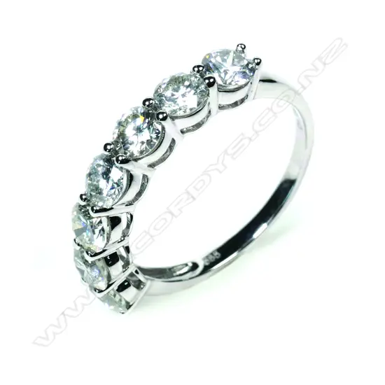 A 14ct white gold seven stone diamond ring