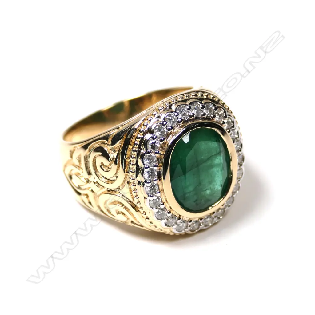A 14ct gold emerald and diamond gent’s ring Image 1++