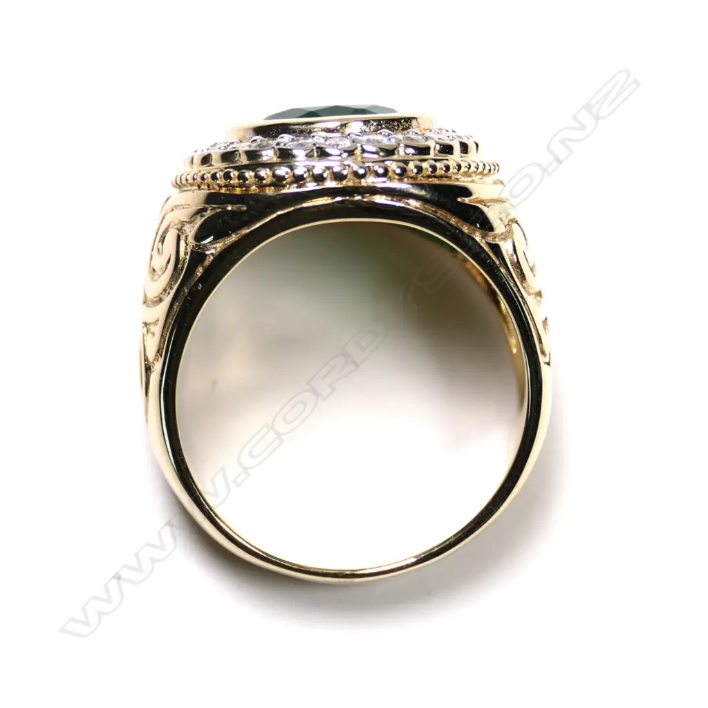 A 14ct gold emerald and diamond gent’s ring Image 1++