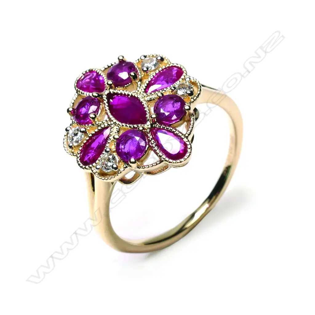 A 14ct gold ruby and diamond ring Image 1++