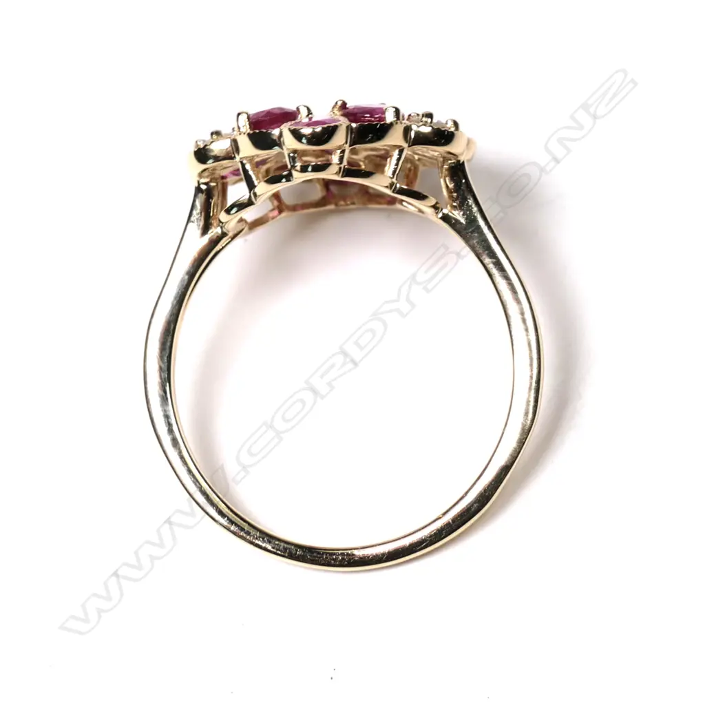 A 14ct gold ruby and diamond ring Image 1++