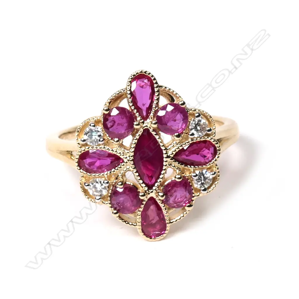 A 14ct gold ruby and diamond ring Image 1++