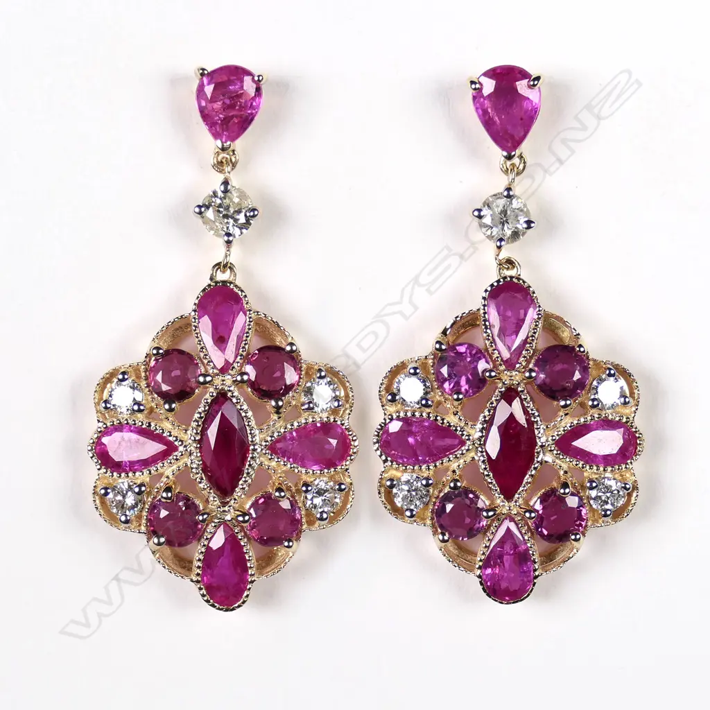 A pair of 14ct gold ruby and diamond drop earrings Image 1++