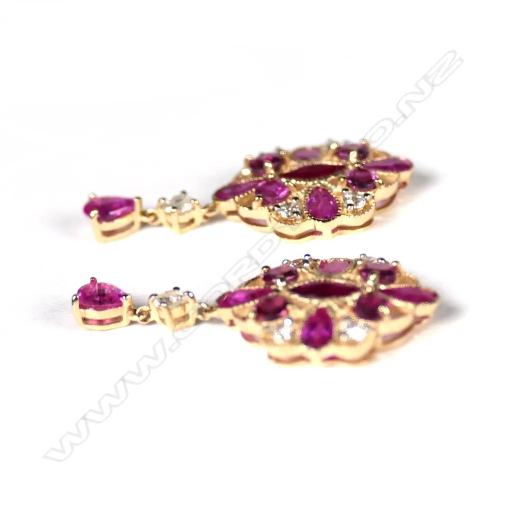 A pair of 14ct gold ruby and diamond drop earrings Image 1++