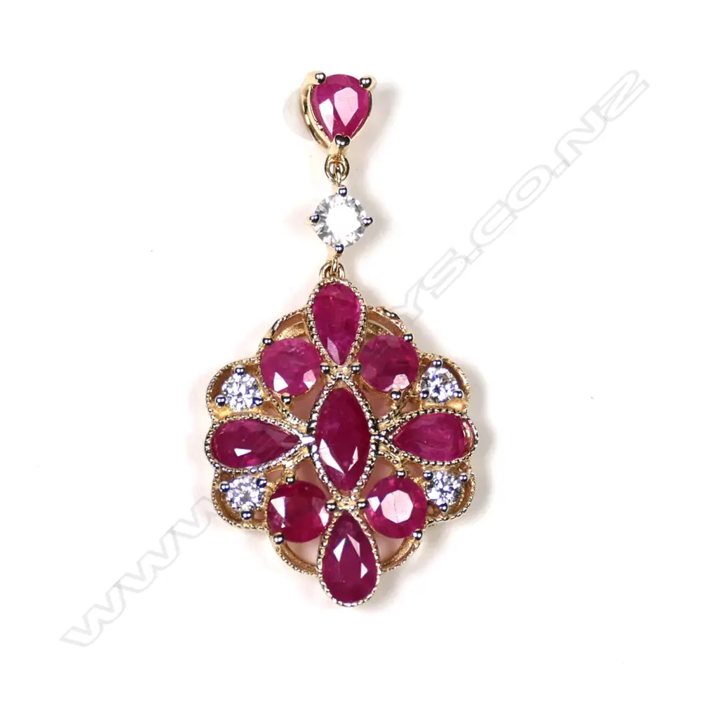 A 14ct gold ruby and diamond drop pendant Image 1++