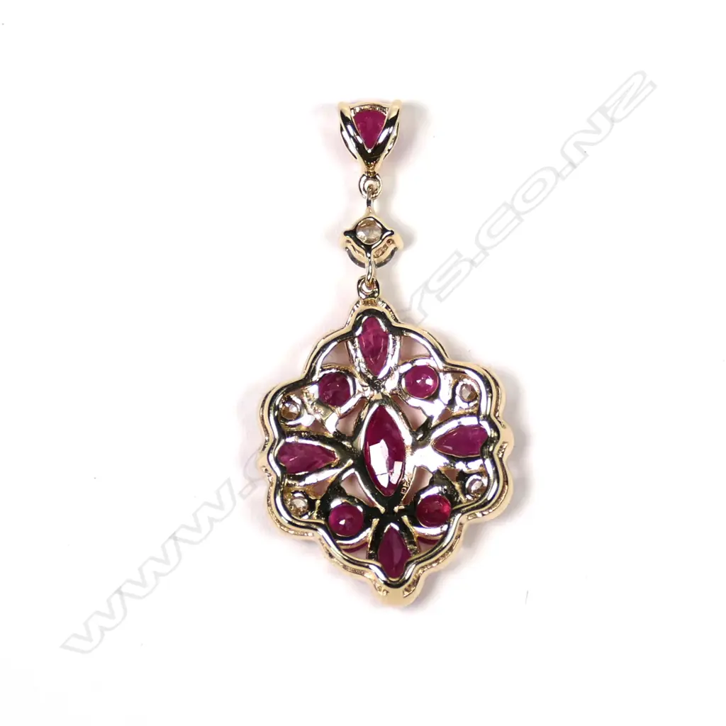 A 14ct gold ruby and diamond drop pendant Image 1++
