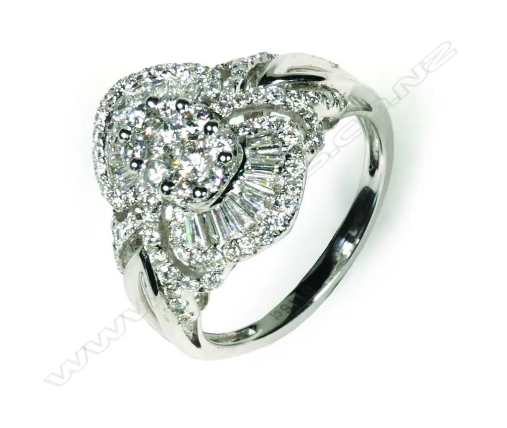 A modern 18ct white gold diamond cluster ring Image 1++