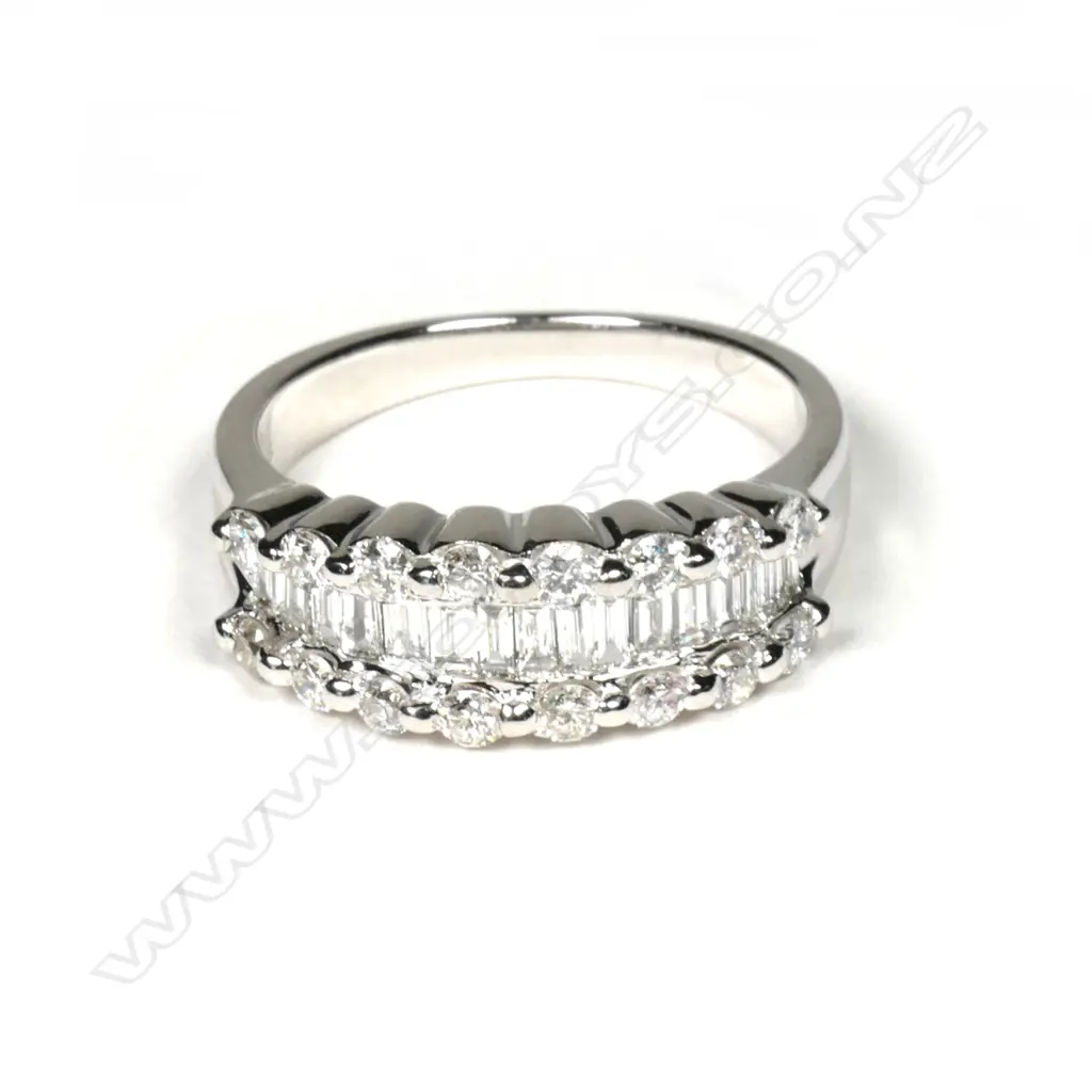 An 18ct white gold and multi diamond ring Image 1++