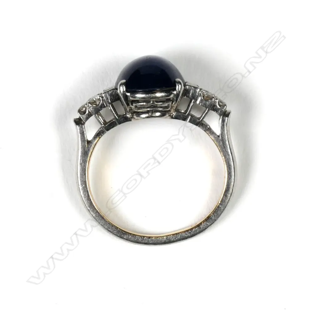 A vintage 14k cabochon blue sapphire and diamond ring Image 1++